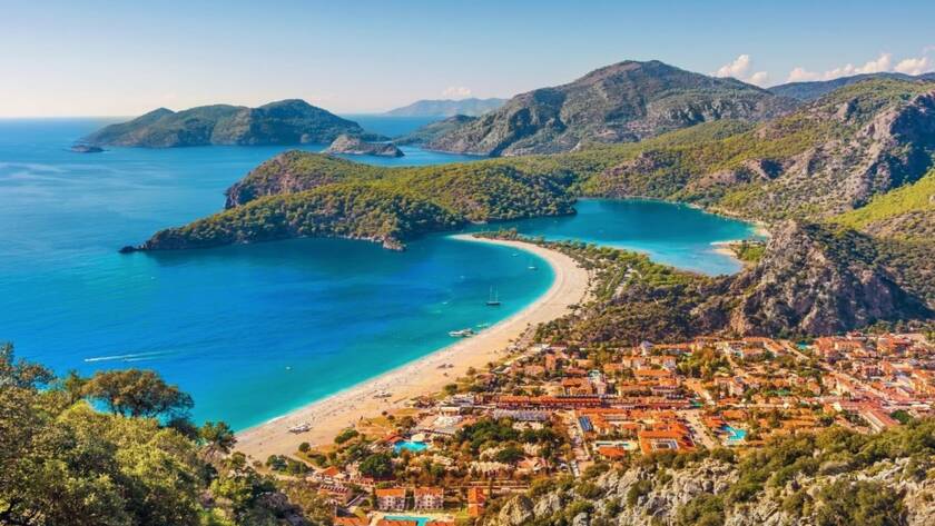 Turquoise paradise: Gulet sails Oludeniz Blue Lagoon, Turkey.