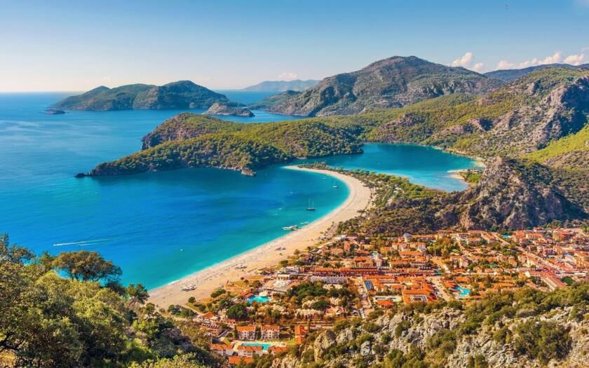 Turquoise paradise: Gulet sails Oludeniz Blue Lagoon, Turkey.