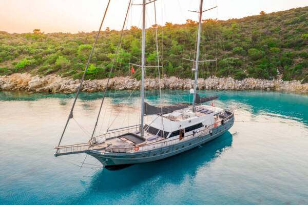 Gulet Virtuoso, a luxury yacht charter in Athens, Greece, offers guests the opportunity to experience the city's ancient history and modern allure.