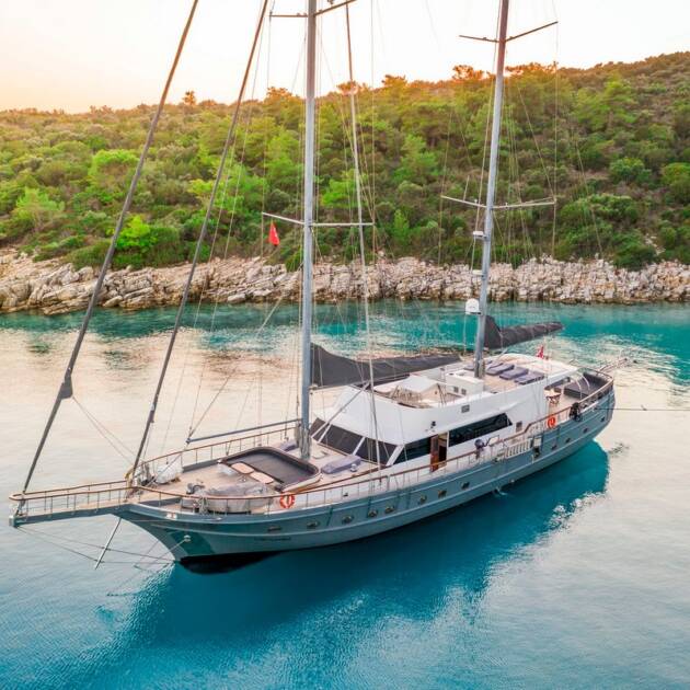 Gulet Virtuoso, a luxury yacht charter in Athens, Greece, offers guests the opportunity to experience the city's ancient history and modern allure.