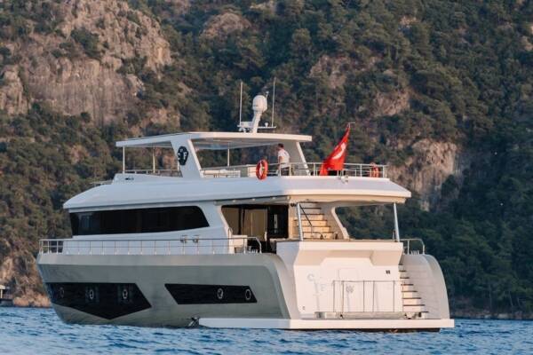 Trawler BY CF, a masterpiece of design, redefines luxury yacht charters with its sleek lines and spacious decks.