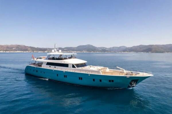 A luxurious gulet yacht cruising the turquoise waters of Bodrum, Turkey.